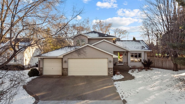 view of front of property with a garage