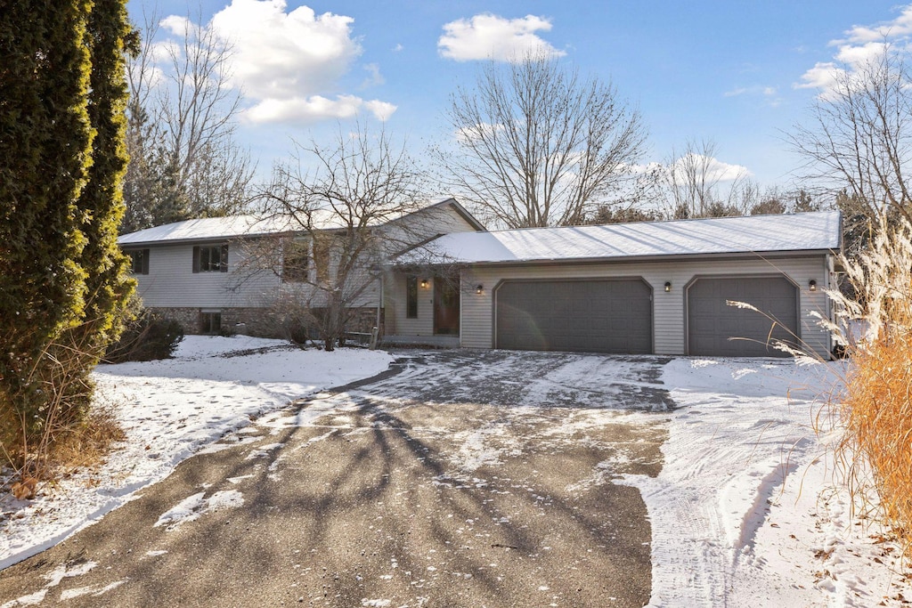 view of front of home with a garage