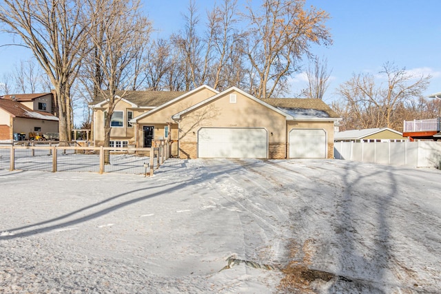 ranch-style house with a garage