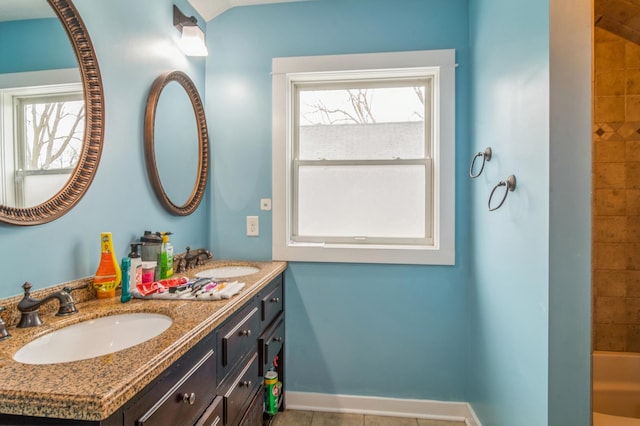 bathroom featuring vanity and tile patterned flooring