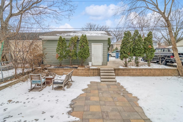 exterior space with an outdoor fire pit