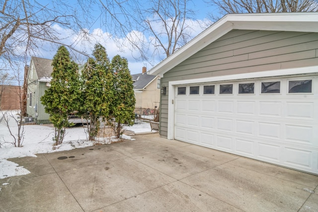 view of snow covered garage