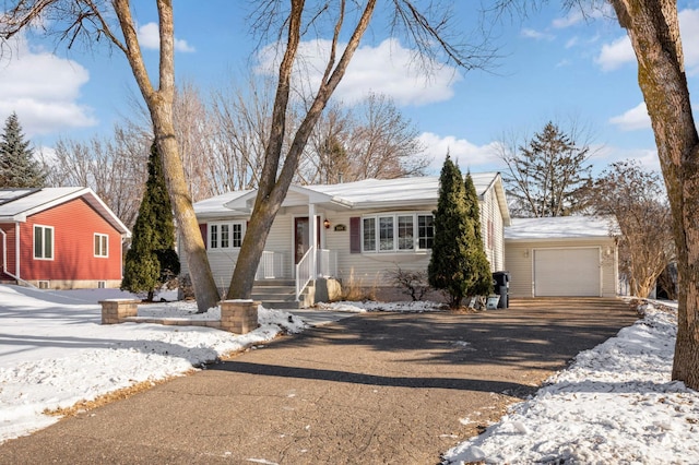 single story home featuring a garage