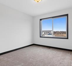 unfurnished room with carpet flooring