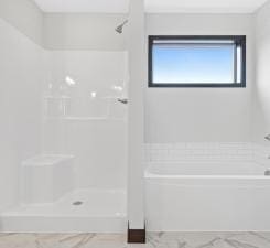 bathroom featuring walk in shower