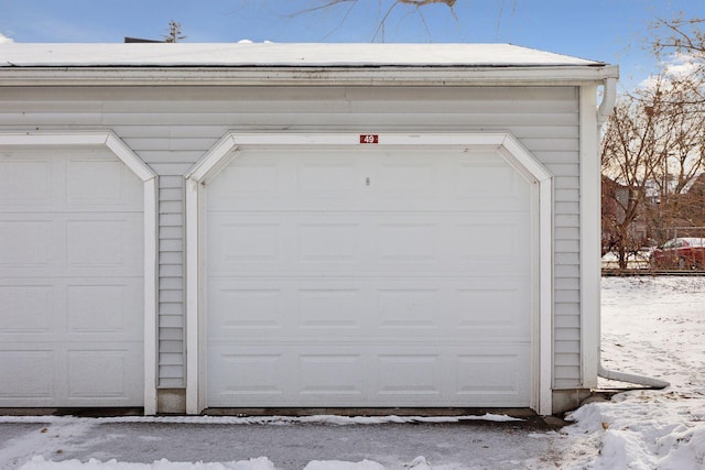 view of snow covered garage