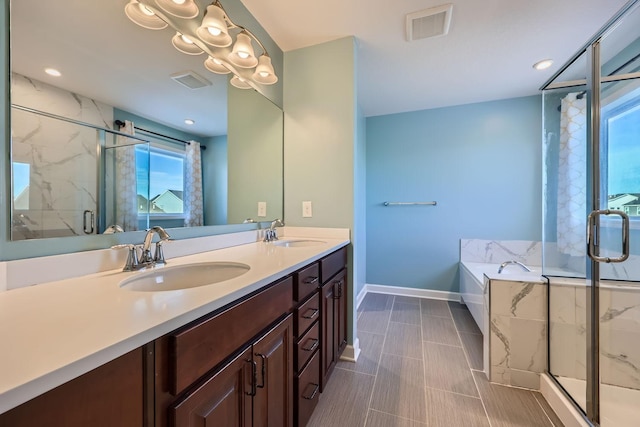 bathroom with vanity and plus walk in shower