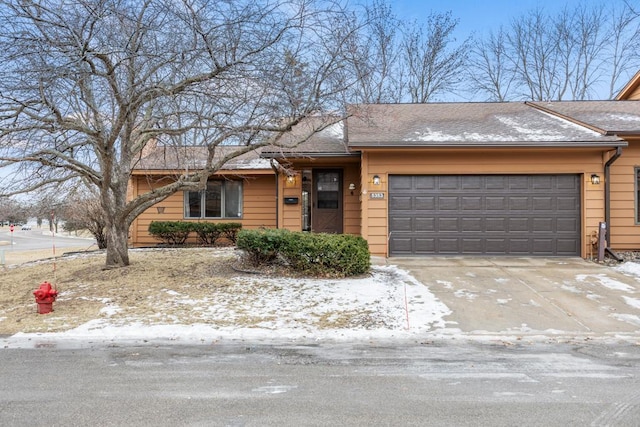 single story home with a garage