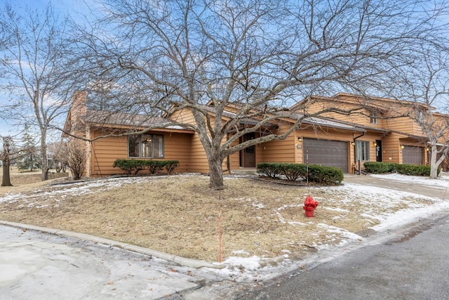 view of front of home with a garage