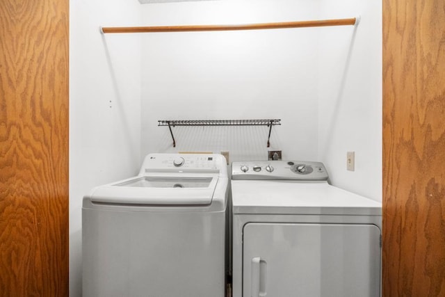 washroom with washer and clothes dryer