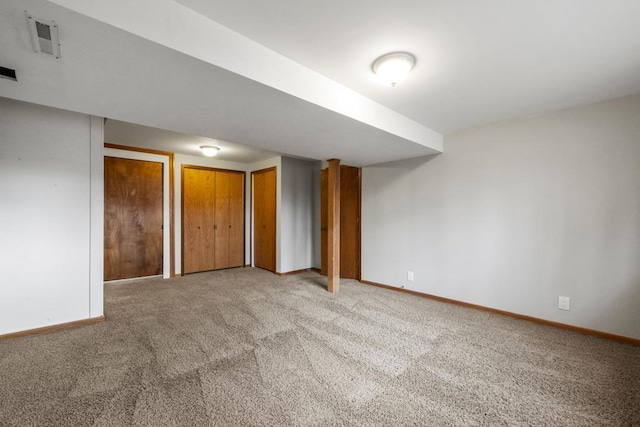 basement featuring carpet flooring