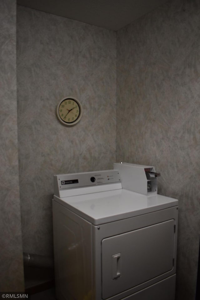 laundry area with washer / dryer