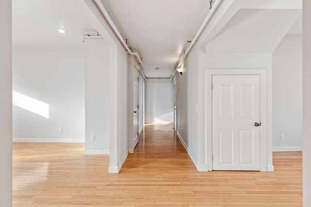 hallway featuring light hardwood / wood-style flooring