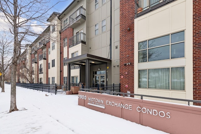 view of snow covered building