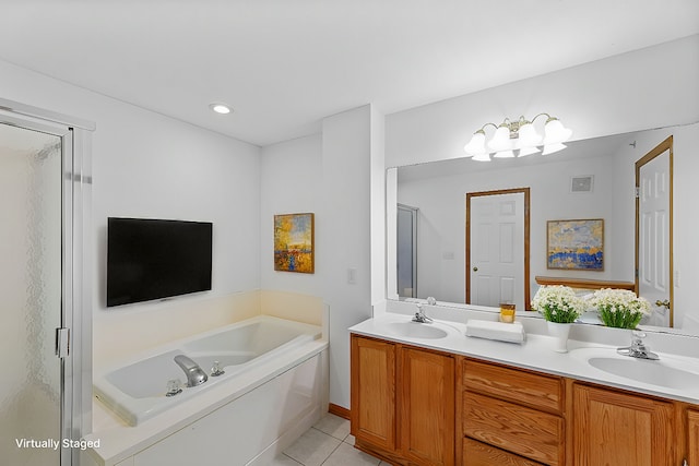 bathroom with vanity, tile patterned flooring, and separate shower and tub