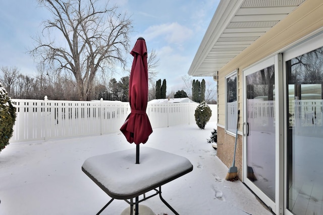 view of yard covered in snow