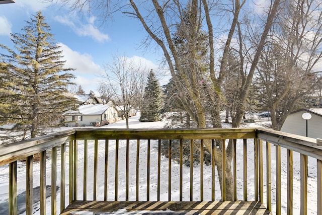 view of snow covered deck