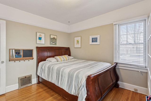 bedroom featuring light hardwood / wood-style floors