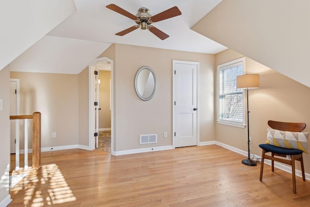 bonus room featuring lofted ceiling, ceiling fan, and light wood-type flooring