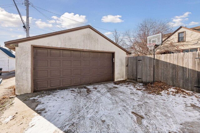 view of snow covered garage