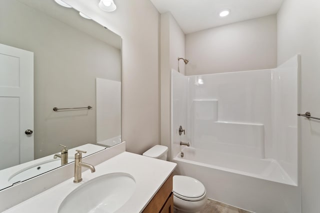 full bathroom featuring vanity, tub / shower combination, and toilet