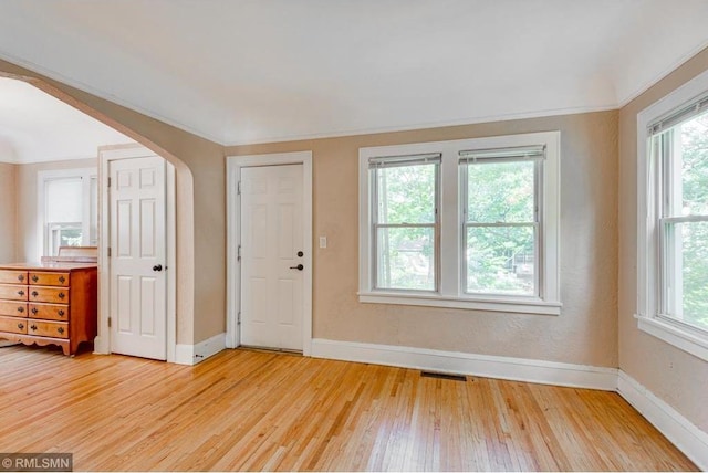 foyer entrance with light hardwood / wood-style flooring