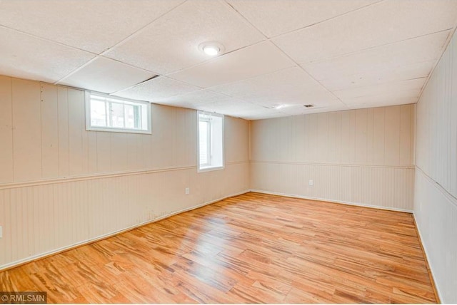 basement featuring hardwood / wood-style flooring