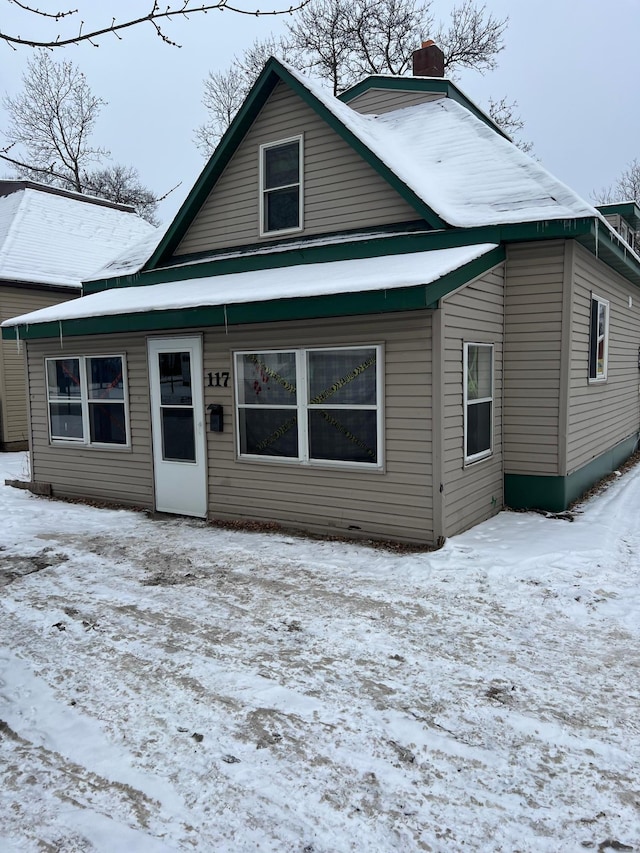 view of snow covered property