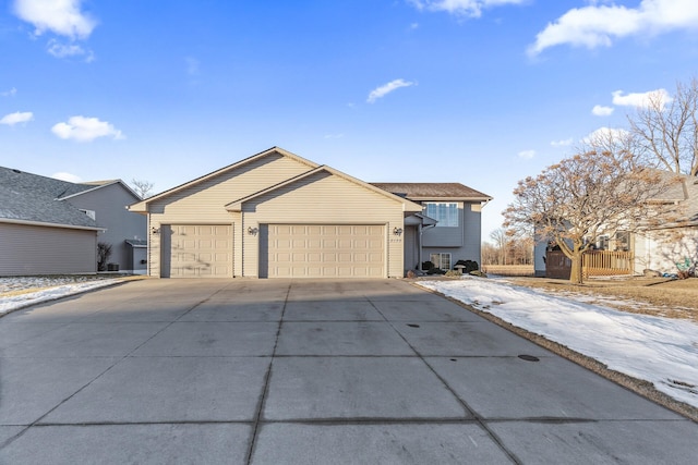 ranch-style house featuring a garage