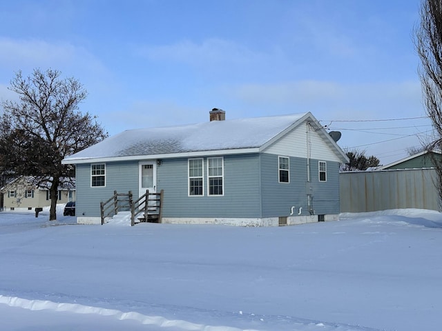 view of snow covered property