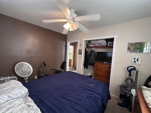 bedroom with ceiling fan, a closet, and carpet