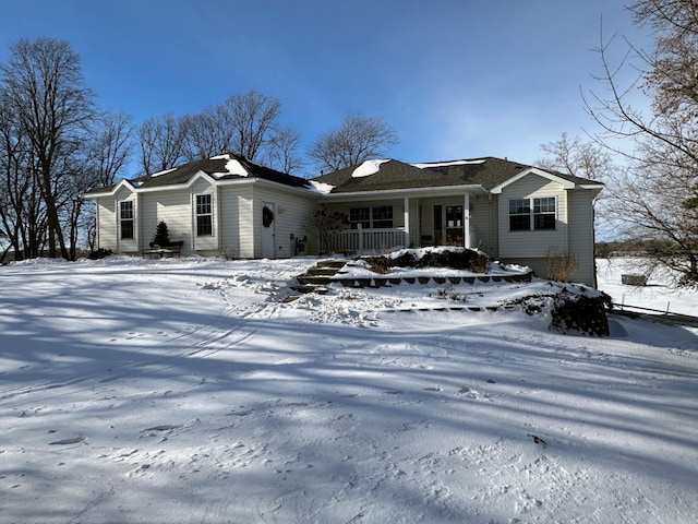 ranch-style house with covered porch