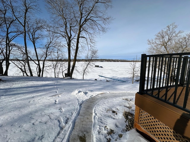 view of yard layered in snow