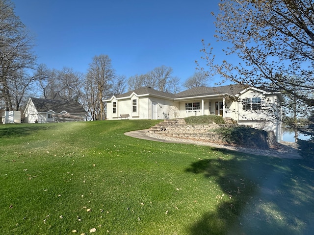 43561 Paul Lake Dr, Edna Twp, MN 56573 - view of home's exterior featuring a yard