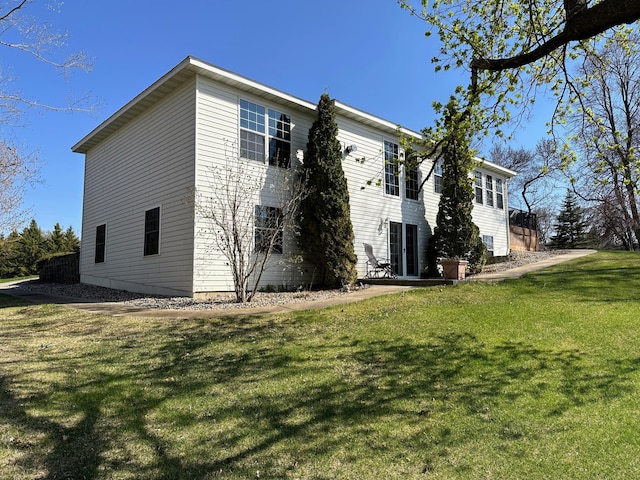43561 Paul Lake Dr, Edna Twp, MN 56573 - view of property exterior featuring a yard