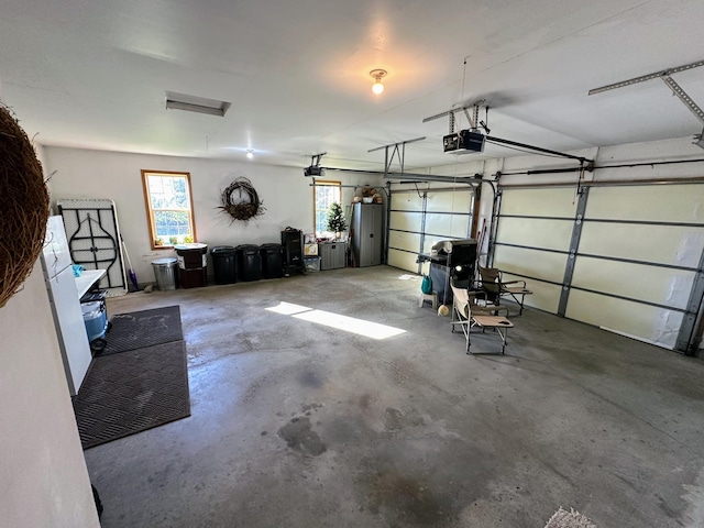 43561 Paul Lake Dr, Edna Twp, MN 56573 - garage with a garage door opener
