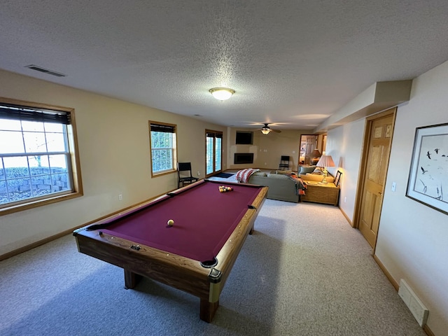 43561 Paul Lake Dr, Edna Twp, MN 56573 - game room featuring a textured ceiling, light colored carpet, healthy amount of natural light, and pool table