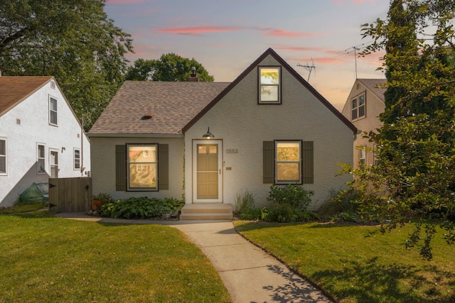 view of front of home featuring a yard