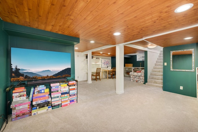 rec room featuring carpet and wooden ceiling