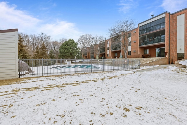 view of snow covered pool