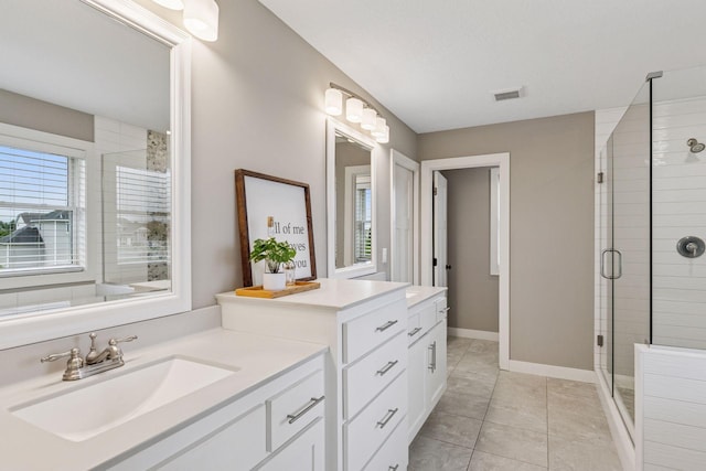 29135 Scenic Dr, Chisago City, MN 55013 - bathroom with a stall shower, vanity, and healthy amount of natural light