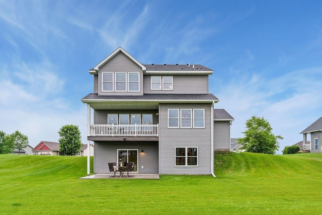 29135 Scenic Dr, Chisago City, MN 55013 - back of house with a lawn, a patio area, and a balcony