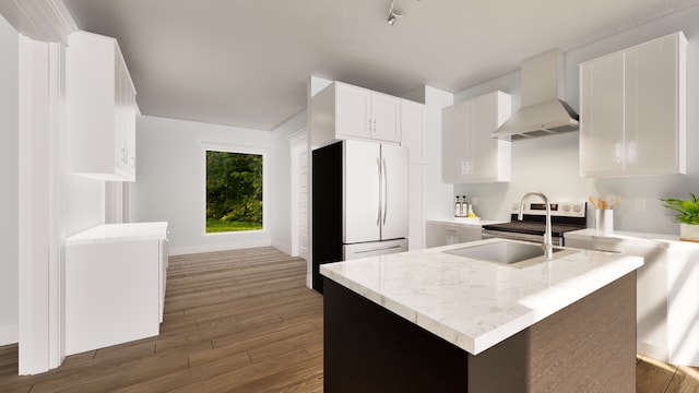 kitchen with wall chimney exhaust hood, white refrigerator, sink, white cabinetry, and dark hardwood / wood-style floors