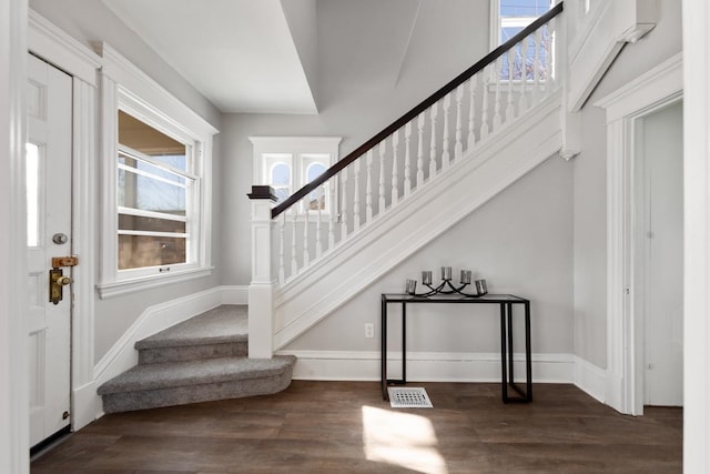 foyer with dark wood-type flooring