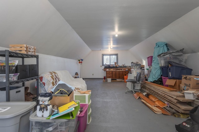 interior space featuring vaulted ceiling