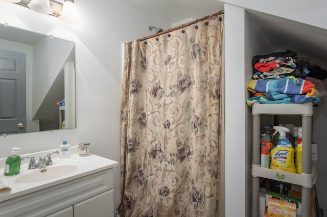 bathroom with vanity and a shower with shower curtain