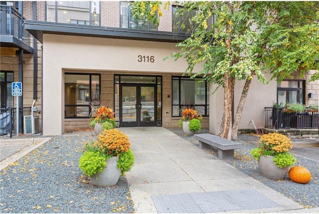 property entrance featuring french doors