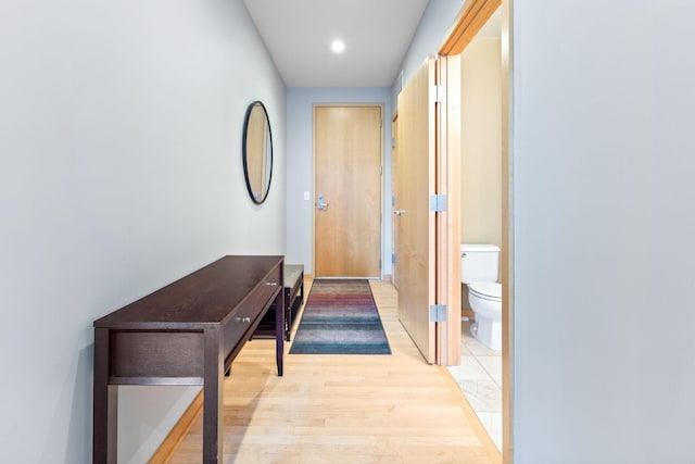 hallway featuring light wood-type flooring