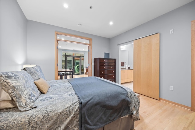 bedroom with a closet and light wood-type flooring