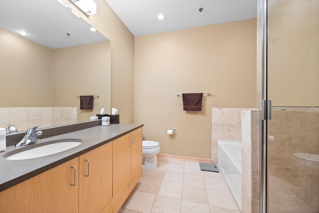 full bathroom with toilet, vanity, independent shower and bath, and tile patterned floors